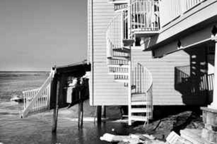 Two houses on the bay side of Sea Isle City were in danger of slipping into the water after a bulkhead collapsed over the weekend. A third property was also damaged.