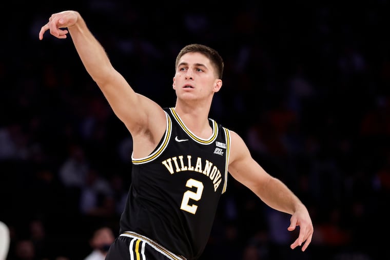Villanova guard Collin Gillespie (2) watches his shot against Syracuse during the second half of the Jimmy V Classic on Tuesday in New York. Villanova won 67-53. Villanova shot just 12-50 from three-point range, but still won.