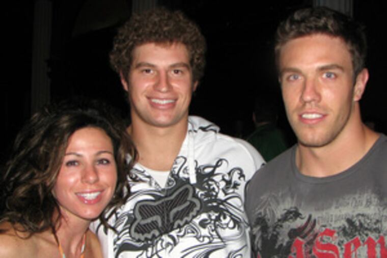 Eagles tight end Brent Celek (center) will complete a nifty reception when he marries beer exec Susie Johnsen at the Union League. Huddling with them is best man Stewart Bradley, also a Eagle.