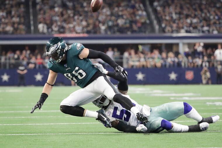 Eagles tight end Zach Ertz gets the pass deflected away by Dallas Cowboys middle linebacker Jaylon Smith during the third-quarter of Sunday's game. Ertz had two catches, none in the first three quarters.