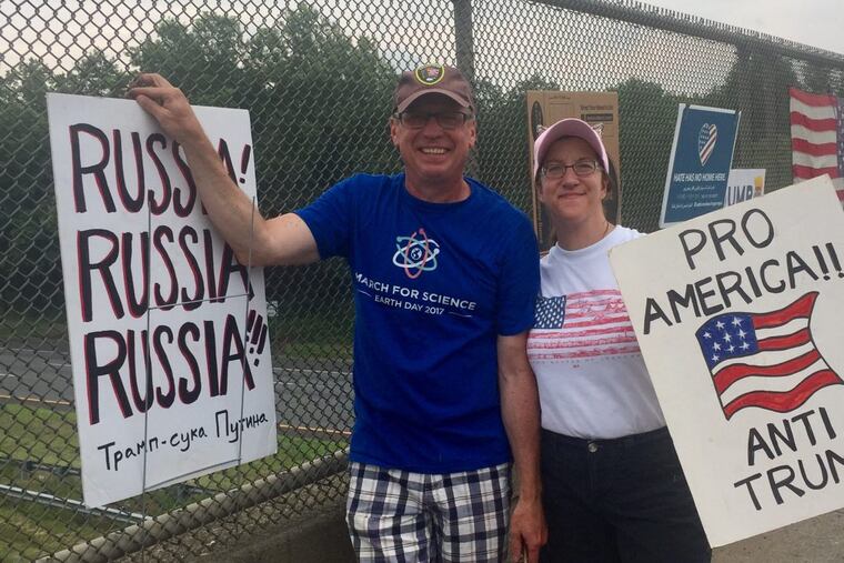 Tim and Dominae Levielle of Bedminster, two of the protesters against President Trump near his golf course, which is hosting the U.S. Womens Open.