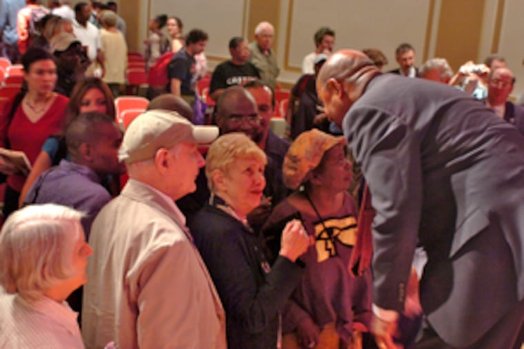 Democrat Michael Nutter greets members of the Free Library audience after the hour-long mayoral forum.
