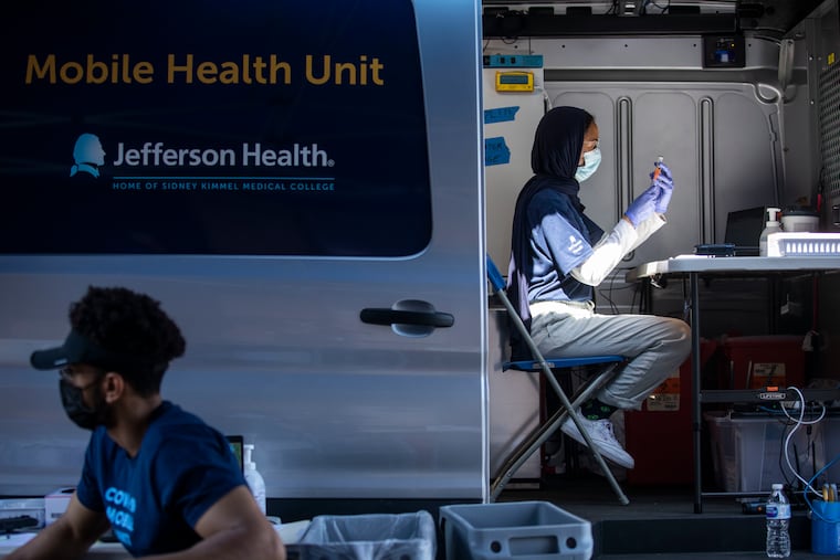 Jefferson Health's mobile vaccination clinics, such as this one in May 2021, inspired physician Bon Ku to dream bigger. Now a program manager at the federal ARPA-H health research agency, he is seeking design proposals for a vehicle equipped with many more services, including a mobile CT scanner.