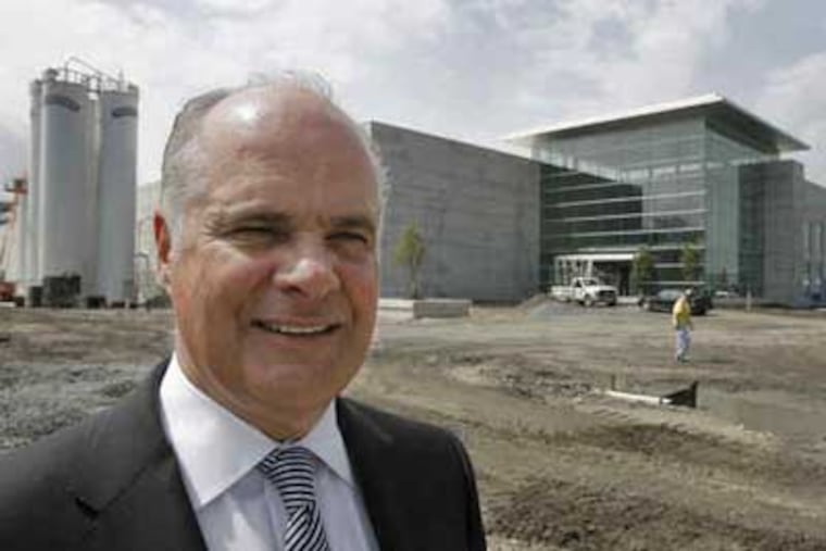 Charles P. Pizzi outside Tasty Baking Company's new corporate offices at the Philadelphia Navy Yard. (Akira Suwa / Staff Photographer)