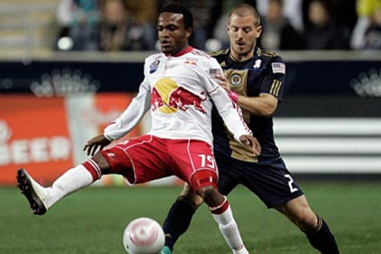Union defender Jordan Harvey will not play in Friday's match after receiving a red card last match. (Rich Schultz/AP Photo)