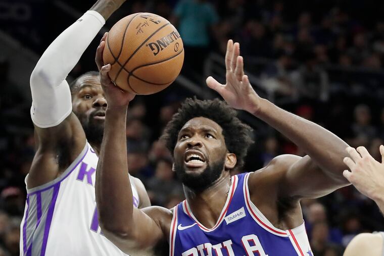 Sixers Joel Embiid was focused on the net while scoring a game-high 33 points against the Sacramento Kings on Wednesday.