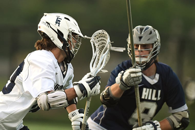 Hill School's Defenseman Bill Cowan, right, defends against Episcopal
Academy Midfielder Kurt MArtellucci in the first quarter of play in
the Inter-AC Challenge quarterfinal game Wednesday, May 13, 2015 in
Conshohocken, Pa. (Bradley C Bower/Staff Photographer)