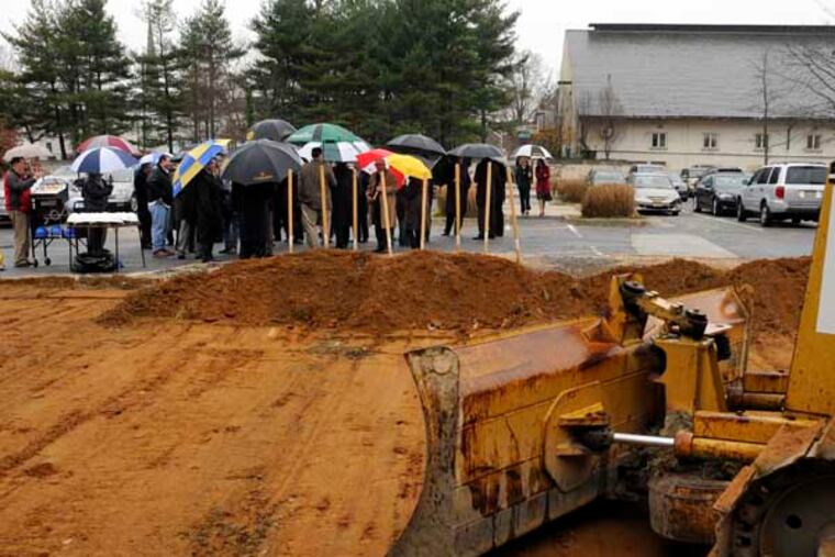 Moorestown breaks ground for its new municipal complex and library December 7, 2012, five years after a fire damaged the old town hall. The current library is at rear. ( TOM GRALISH / Staff Photographer )