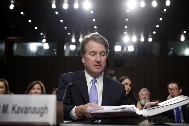 President Donald Trump's Supreme Court nominee, Brett Kavanaugh readies his papers before he testifies before the Senate Judiciary Committee on Capitol Hill in Washington, Thursday, Sept. 6, 2018. Kavanaugh's confirmation was thrust into uncertainty Sunday after Christine Blasey Ford told the Washington Post that Kavanaugh sexually assaulted her while both were in high school.