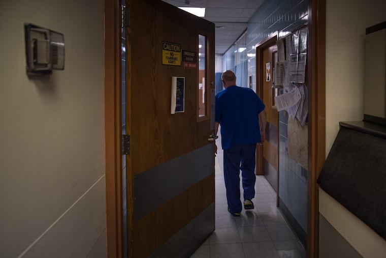 Dr. Alan Edwards enters the emergency room to tend to patients at Bucktail Medical Center in South Renovo, Pennsylvania. Edwards works in both the ER as a doctor on call, as well as in acute care.