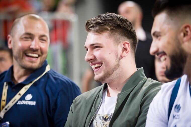 Marko Milič and Luke Dončić, Slovenian basketball stars a generation apart.