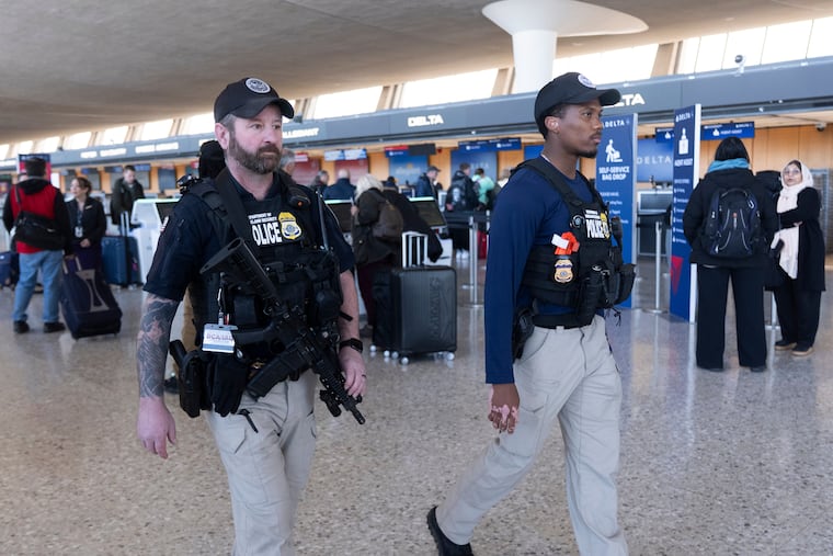 Department of Homeland Security federal air marshals patrol Washington Dulles International Airport, in Chantilly, Va., Tuesday, March 24, 2026.