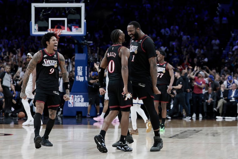 Tyrese Maxey celebrates with teammates after giving the Sixers a 109-97 lead over the Magic in the fourth quarter on Wednesday.