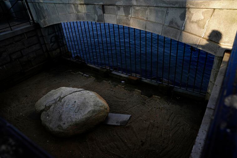 Plymouth Rock, the traditional point of arrival of the Puritans on the Mayflower in 1620, in Plymouth, Mass.