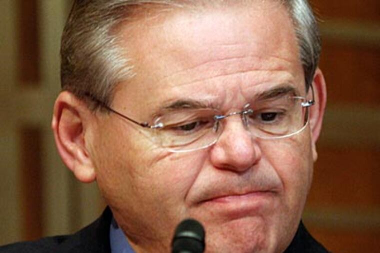 In this June 17, 2009, file photo, Senate Energy and Natural Resources Committee member Sen. Robert Menendez, D-N.J., listens during the committee's markup hearing on energy legislation on Capitol Hill in Washington. (AP Photo/Harry Hamburg, File)