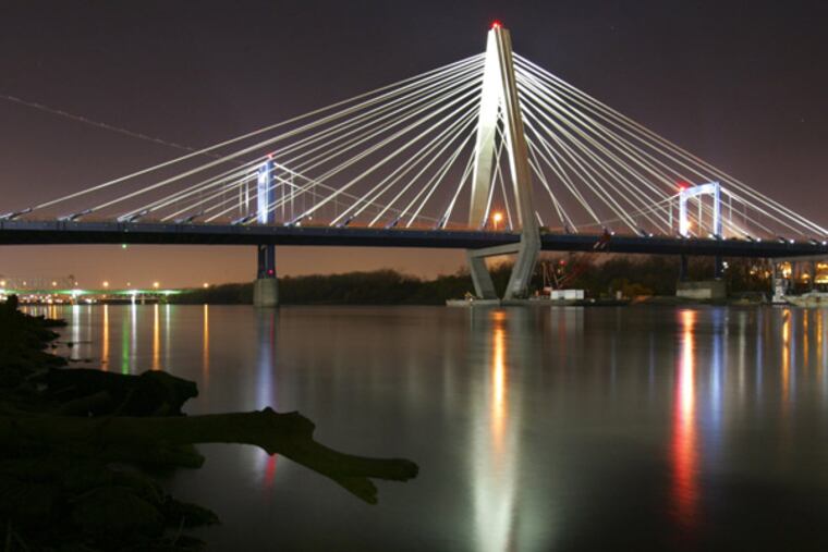 The new Christopher S. Bond Bridge is 316 ft. tall and is called a cable-stayed bridge, because the 40 cables are in a ''stayed'' or fixed position. (David Pulliam/Kansas City Star/MCT)