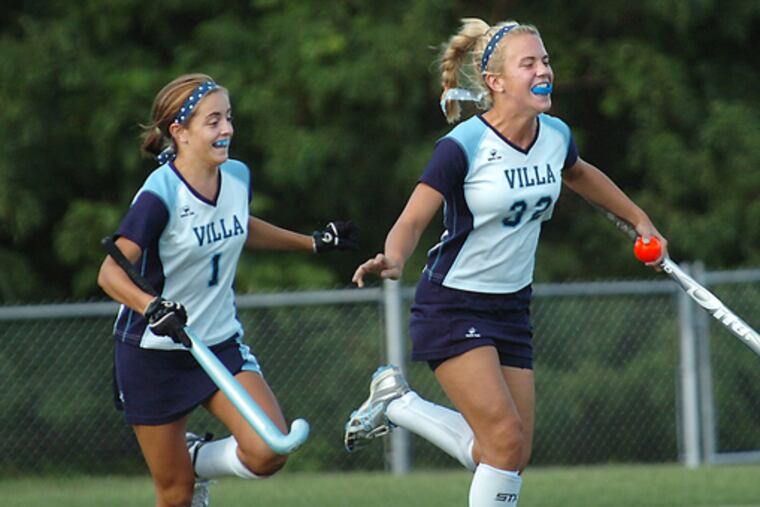 Sera Berlacher (32) of Villa Maria celebrates a goal, along with teammate Marie Elena Bolles, against Merion Mercy. Berlacher scored 23 goals.