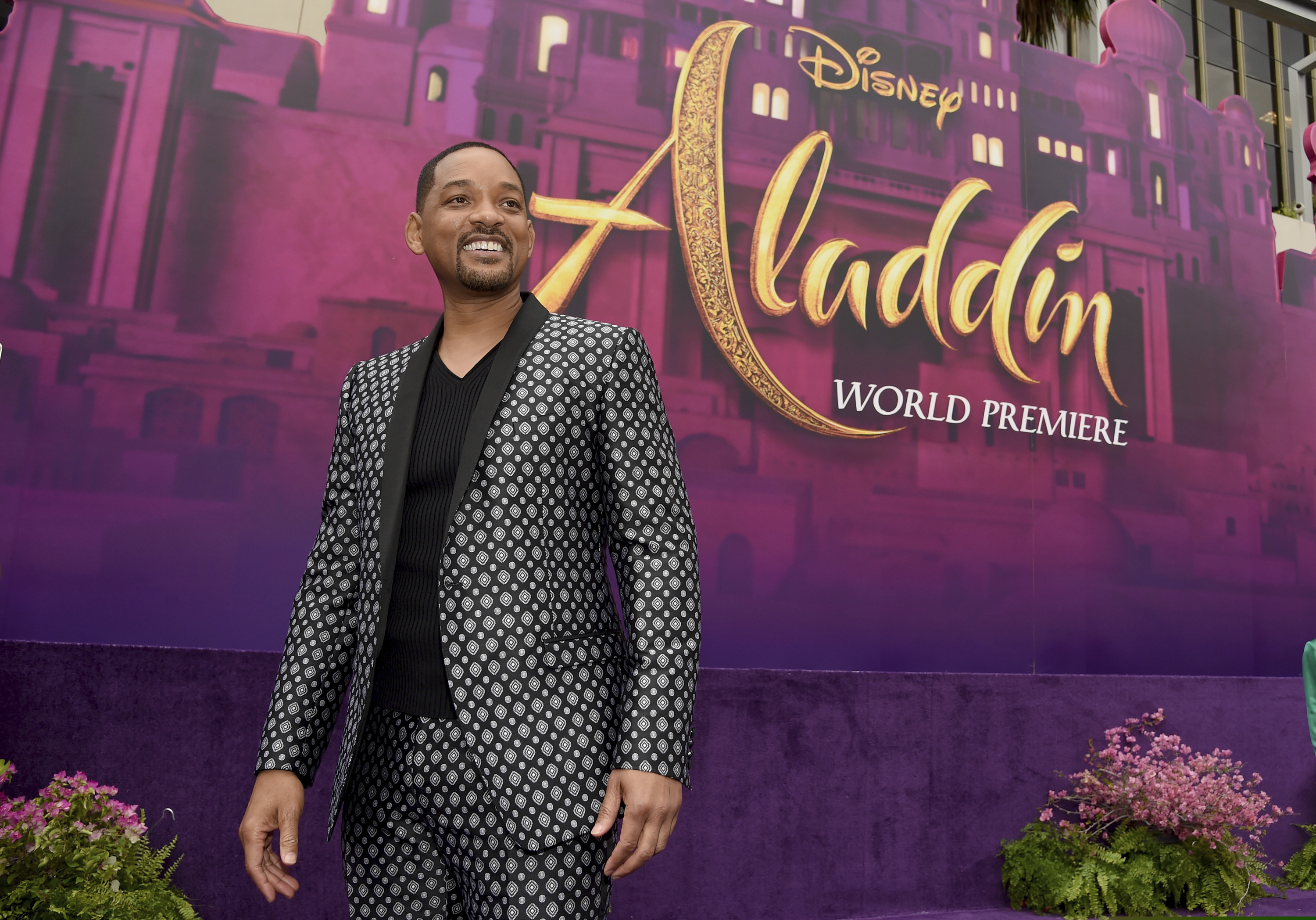 Will Smith arrives at the premiere of "Aladdin" on Tuesday, May 21, 2019, at the El Capitan Theatre in Los Angeles. (Photo by Chris Pizzello/Invision/AP)
