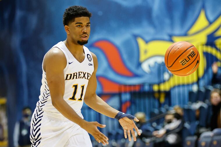 Drexel guard Camren Wynter passes the basketball against James Madison on Monday, February 7, 2022 in Philadelphia