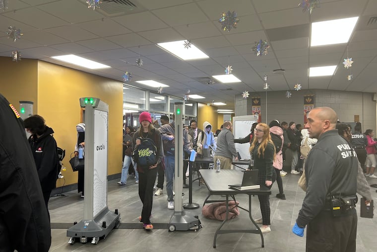 Students at Upper Darby High School pass through its new Evolv weapons detection system on Thursday, the second day of the new security measures.