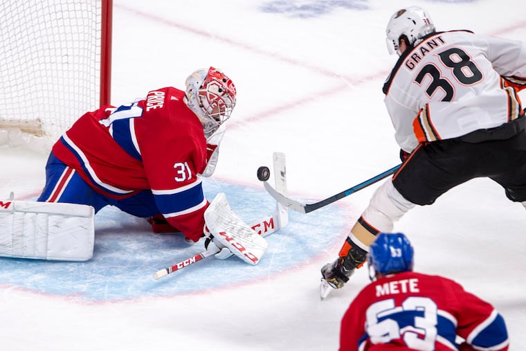Montreal goaltender Carey Price stopping Anaheim Ducks center Derek Grant during a Feb. 6 game. Grant was acquired by the Flyers on Monday and will make his debut for them Tuesday against visiting San Jose.