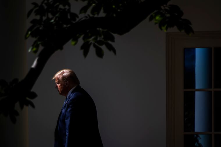 President Donald Trump walks toward Marine One on the South Lawn of the White House on Oct. 23.