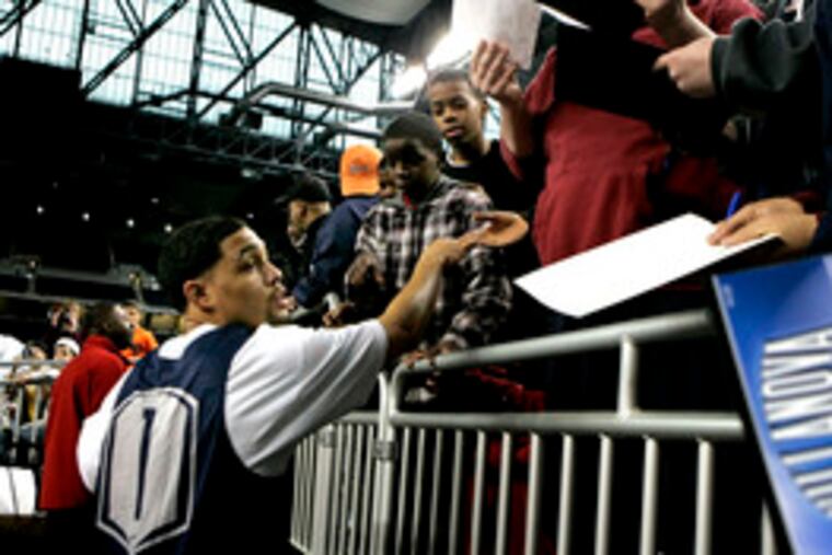 Scottie Reynolds meets with fans after Villanova practiced for its Sweet 16 face-off with Kansas tonight. He had originally committed to Oklahoma.