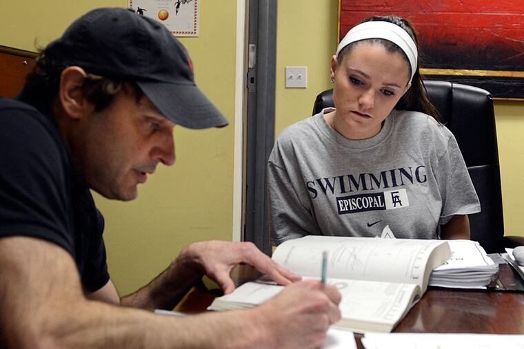 MJ Test Prep co-owner Matt Joseph tutors Gillian Smith at the business in Bryn Mawr. Smith, 17, is a junior at Episcopal Academy. TOM GRALISH / Staff Photographer