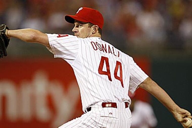 Since being traded by the Astros, Roy Oswalt is 3-1 with a 2.43 ERA for the Phillies. (Yong Kim / Staff Photographer)