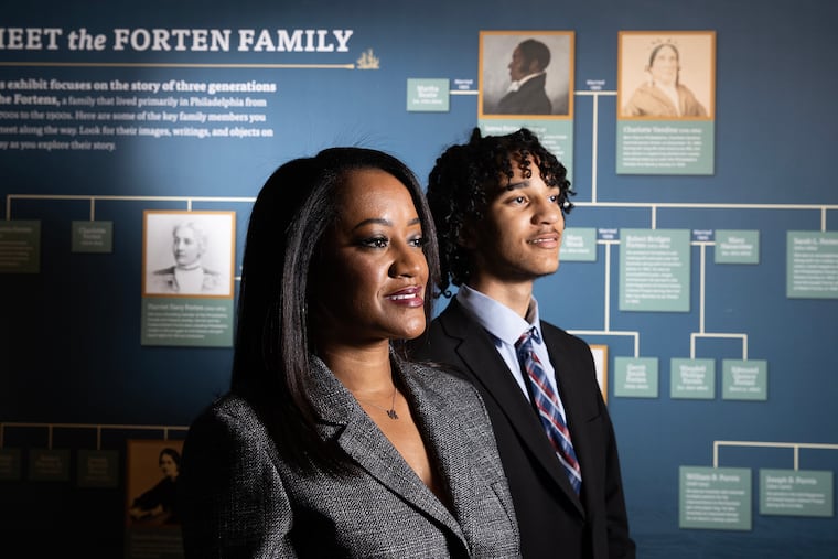 Karla Trotman joined the board of the Museum of the American Revolution after her son, Bryce, became fascinated with the American Revolution. While working on the Black Founders Exhibition Committee about James Forten, Trotman learned of her own family's connections to Forten. Karla and Bryce, now 15, are shown at the exhibit on Nov. 14, 2023.