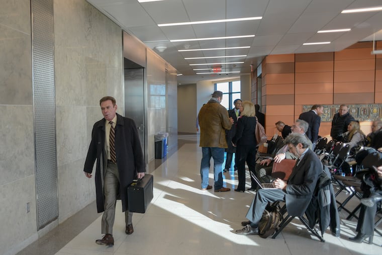 Sean Kratz's new attorney, A. Charles Peruto Jr., arrives for Monday's pretrial hearing in Doylestown.