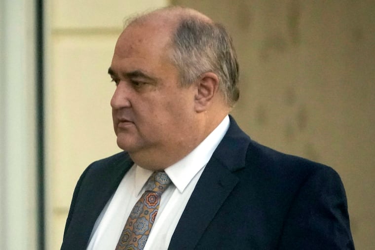 John Davis, former director of the Mississippi Department of Human Services, enters the Thad Cochran United States Courthouse in Jackson, Miss., Thursday, Sept. 22, 2022.