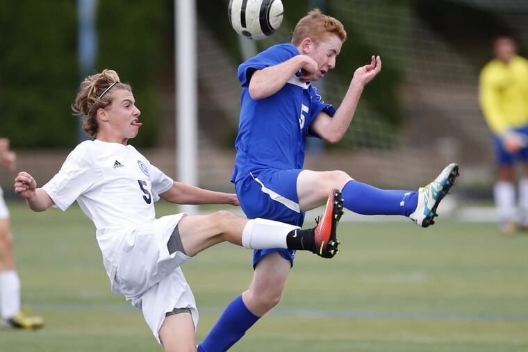 Dan Goodson, left, of Shawnee and Sean Zemlak of Washington Twp. go after the ball in the 2nd half of a boys' soccer match on Oct. 4, 2016. Washington Twp. won 3-1. CHARLES FOX / Staff Photographer