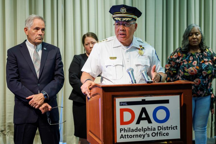 Police Commissioner Kevin Bethel addressing the media Monday. In back from left is District Attorney Larry Krasner, Assistant District Attorney Amanda Hendrick, and Angela Wade, a mother who lost her son to gun violence.