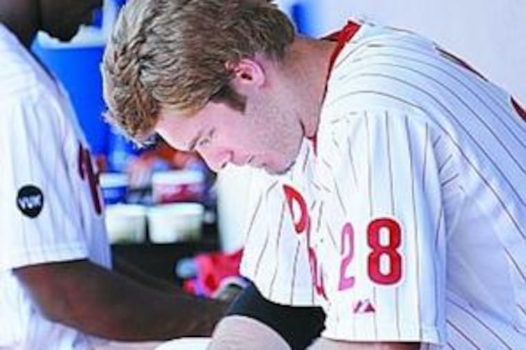 Jayson Werth, who went 0-for-4, sits in dugout after Phillies' 4-1 loss to Cubs.