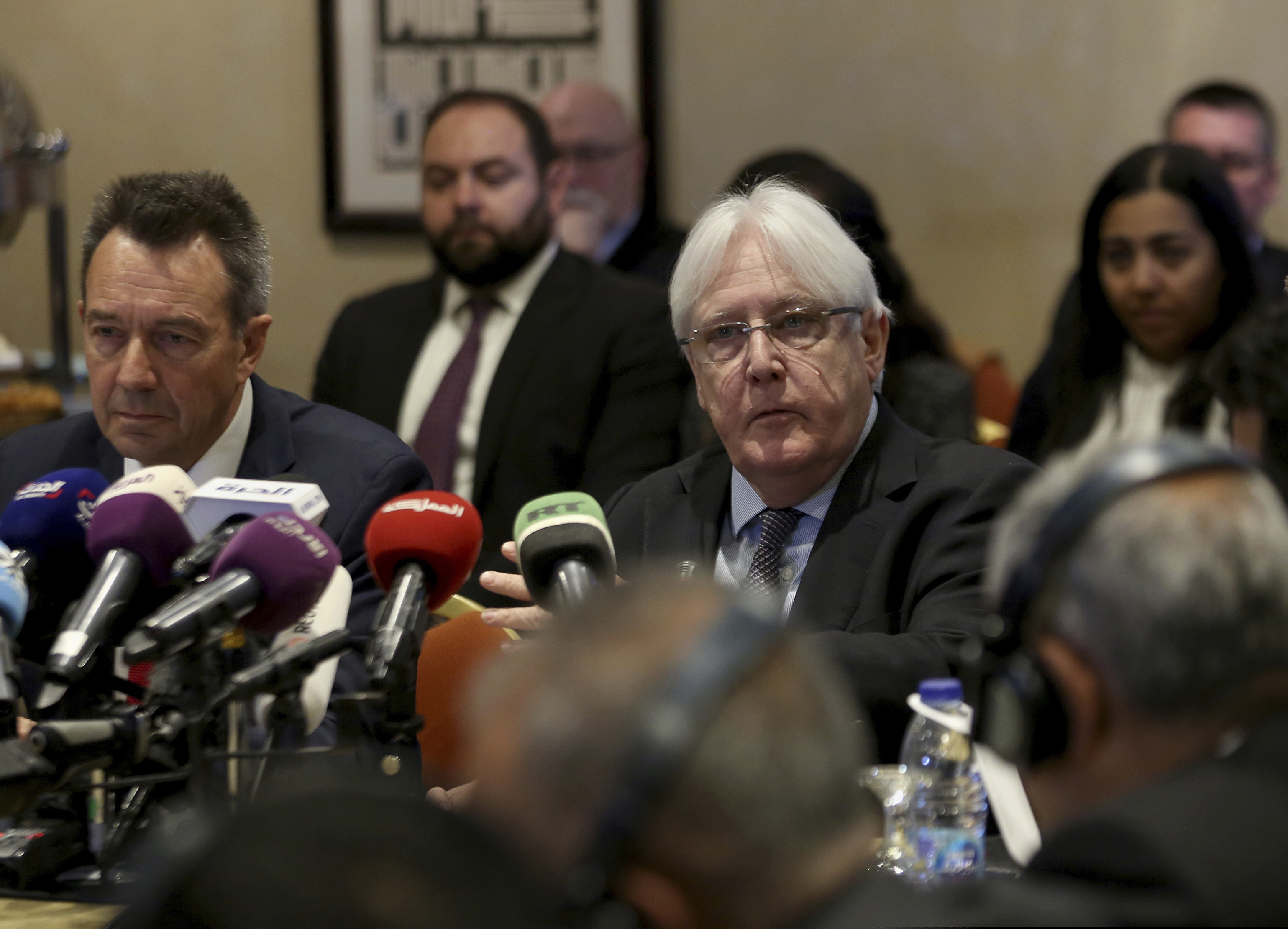 In this Feb. 5, 2019 photo, United Nations Special Envoy to Yemen Martin Griffiths, center, and President of the International Committee of the Red Cross Peter Maurer, speak during a new round of talks by Yemen's warring parties in Amman, Jordan.