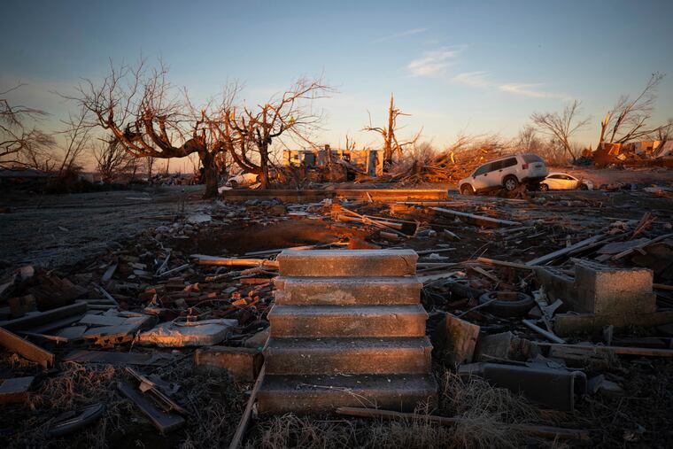 The front steps of a house are all that remains on Sunday after a tornado came through Dawson Springs, Ky., on Friday.