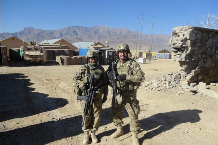 Jasmine Walker Motupalli (left) then a captain in the U.S. Army, is shown in Afghanistan in 2012 with 1st Sgt. Shane Werst.