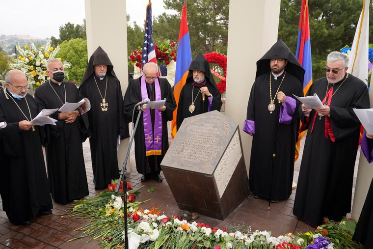 Religious leaders sing at a ceremony remembering the victims of the Armenian Genocide at the Montebello Armenian Genocide Monument in Montebello, Calif., Saturday, April 24, 2021. The United States is formally recognizing that the systematic killing and deportation of hundreds of thousands of Armenians by Ottoman Empire forces in the early 20th century was "genocide" as President Joe Biden used that precise word that the White House has avoided for decades for fear of alienating ally Turkey.