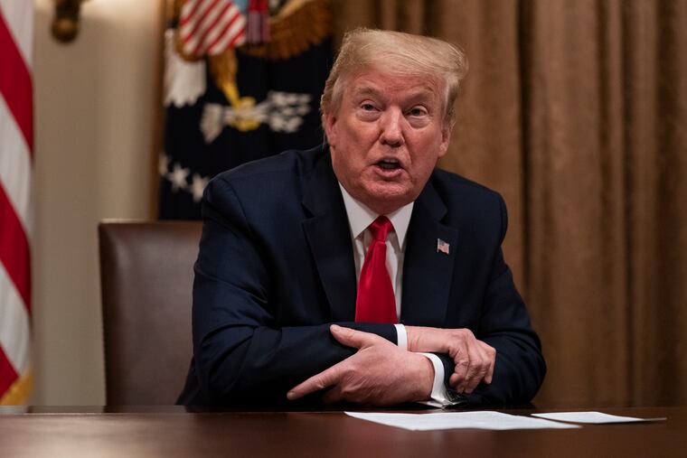 President Donald Trump speaks during a meeting with business leaders on coronavirus testing in the Cabinet Room of the White House on Monday.