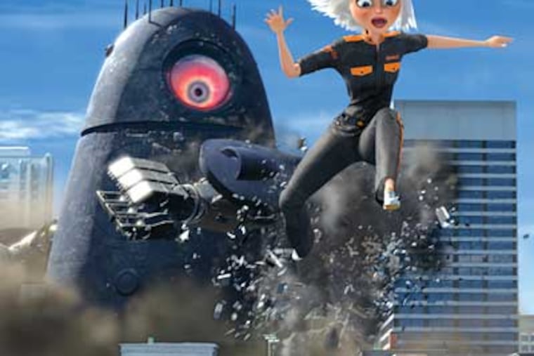 An invading alien robot pursues Ginormica (Reese Witherspoon).