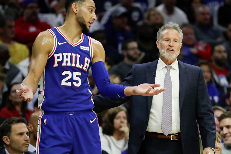 Sixers guard Ben Simmons with Head Coach Brett Brown against the Chicago Bulls on Thursday, October 18, 2018 in Philadelphia. YONG KIM / Staff Photographer