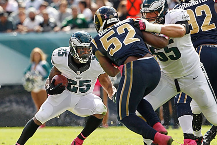 Eagles running back LeSean McCoy and offensive lineman Lane Johnson. (Ron Cortes/Staff Photographer)