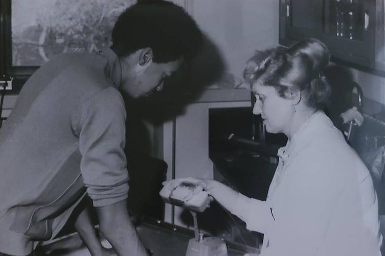 Professor Davies works with student Robert Ross in 1972.