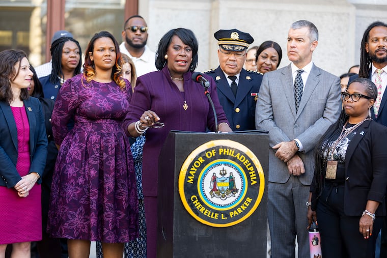 Mayor Cherelle L. Parker holds a news conference in 2024 alongside several officials who have left or are leaving the administration, including City Solicitor Renee Garcia, far left; Chief Deputy Mayor Sinceré Harris, second from left; and Managing Director Adam K. Thiel, in gray.
