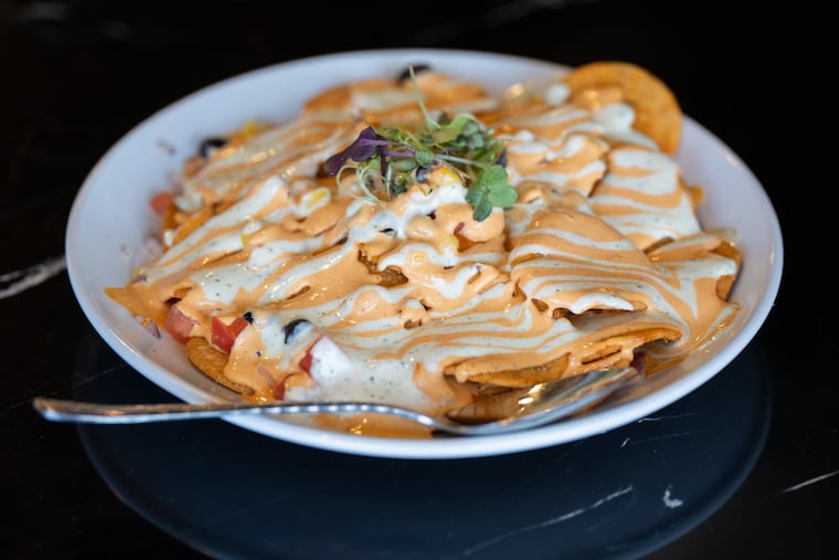 At Vibe Haus on the Main Line, a modern microbrewery meets an Indian fusion kitchen At Vibe Haus on the Main Line, a modern microbrewery meets an Indian fusion kitchen