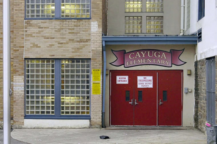Cayuga Elementary School in Hunting Park. Staff and parents at the Hunting Park school had alleged for years that principal Evelyn Cortez had ordered testing improprieties - from instructing students to confirm answers with their teachers before entering them in exam books to changing answers herself, according to a grand jury report.
