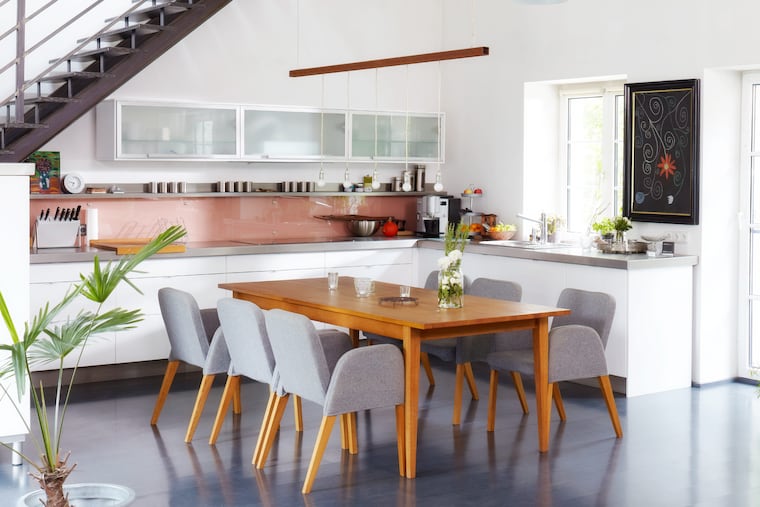 To avoid countertop clutter, perhaps an appliance garage can help hide the coffee maker and toaster, or, edit your cookbooks to the ones you refer to most often with the rest of your collection in another place.