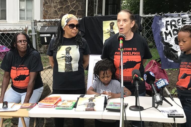 At a press conference on the sidewalk outside the MOVE house on Kingsessing Street, Sue Africa talks about Ramona Africa's cancer.