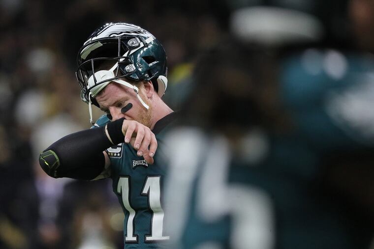 Philadelphia Eagles quarterback Carson Wentz walks off the field after his fourth quarter interception against the New Orleans Saints on Sunday, Nov. 18, 2018 in New Orleans, La. (David Maialetti/Philadelphia Inquirer/TNS)